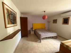 Postel nebo postele na pokoji v ubytování Casa in campagna a Rosciano