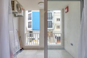 a view from the balcony of a building at New! Modern Studio in central Malta by SF Homes in Msida