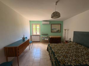 Postel nebo postele na pokoji v ubytování Casa in campagna a Rosciano