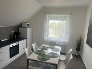 Cucina o angolo cottura di Olivér 22 Apartman