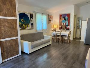 a living room with a couch and a table at Casa Bianca in Vaiano