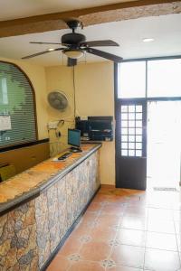 Kuchyň nebo kuchyňský kout v ubytování OYO Hotel Plaza Veracruz Centro Historico