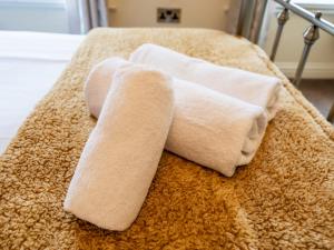 Letto o letti in una camera di Pass the Keys Bright and cosy flat in the centre of Much Wenlock