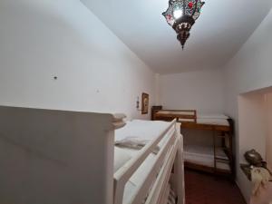 Uma cama ou camas num quarto em HOSTEL bANANA