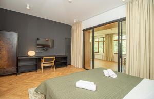 Ένα ή περισσότερα κρεβάτια σε δωμάτιο στο Cozy 1BR Apartment - By Wehost +30 φωτογραφίες