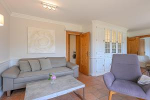 Posezení v ubytování Haus Westsee EG mit Garten