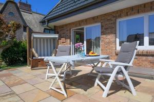 Patio nebo venkovní prostory v ubytování Haus Westsee EG mit Garten