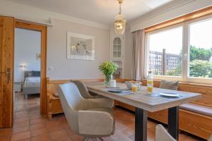 Posezení v ubytování Haus Westsee EG mit Garten