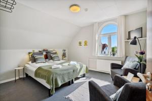 Postel nebo postele na pokoji v ubytování Gredstedbro Hotel + 32 fotografií
