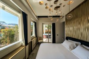 Postel nebo postele na pokoji v ubytování Hotel Nautilus Excelsior - Adults Only + 28 fotografií