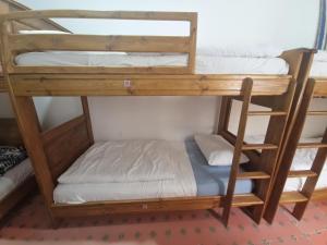 Uma cama ou camas num quarto em HOSTEL bANANA