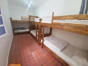 Uma cama ou camas num quarto em HOSTEL bANANA