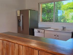 Cuisine ou kitchenette dans l'établissement Gîte Maison Faure