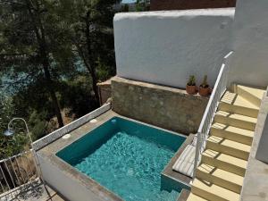 The swimming pool at or close to Casa Trece