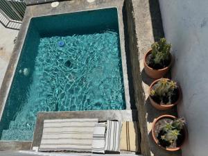 The swimming pool at or close to Casa Trece