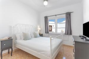 En eller flere senge i et værelse på Casa Taylooney + 23 billeder