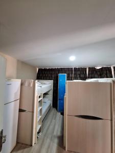 a room filled with boxes and a room with a ceiling at Paxx Istanbul Hotel&Hostel in Istanbul