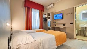 A bed or beds in a room at Valmarina
