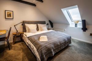 Voodi või voodid majutusasutuse Hotel Birksø toas