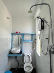 Koupelna v ubytování Quang Minh Homestay Lý Sơn