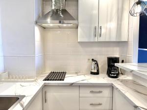 Kuchyňa alebo kuchynka v ubytovaní Precioso apartamento en La Nogalera - Vista al mar