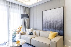 Predel za sedenje v nastanitvi Kingkey Shuibei International Apartment Hotel