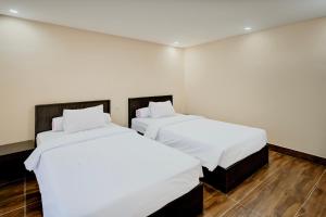 Fotografie z fotogalerie ubytování Hotel O Makassar Near Bandara Sultan Hasanuddin Formerly 88 Inn Maros v destinaci Makasar