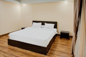 Fotografie z fotogalerie ubytování Hotel O Makassar Near Bandara Sultan Hasanuddin Formerly 88 Inn Maros v destinaci Makasar + 25 fotografií