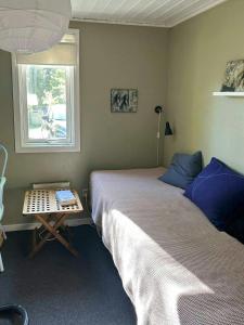 Postel nebo postele na pokoji v ubytování Summer House Where Indoor And Out Blends Together