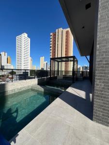 Swimmingpoolen hos eller tæt på Voll 29 Smart Flat Manaíra