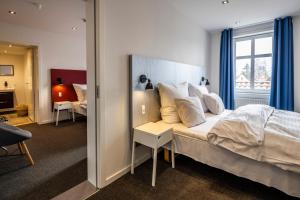 Voodi või voodid majutusasutuse Hotel Birksø toas