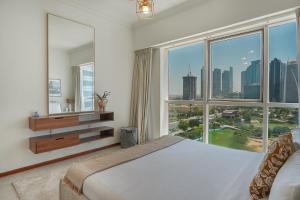 Katil atau katil-katil dalam bilik di EasyGo-Spacious- prime location- Close to Metro