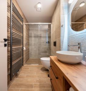 Koupelna v ubytování Resort Aurum Residence A + 37 fotografií