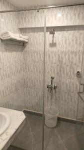 Koupelna v ubytování Hotel PLR Grand