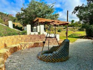 Κήπος έξω από το The Blue Crane