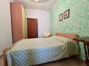 Postel nebo postele na pokoji v ubytování Casa Albachiara + 12 fotografií
