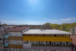 an apartment building with a yellow covering on the roof at Diamond Hotel in Istanbul
