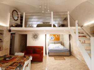Letto o letti in una camera di Le Bianche Suites Ostuni