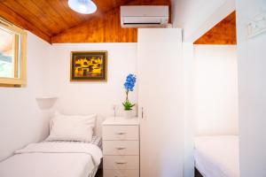 Posteľ alebo postele v izbe v ubytovaní Resort "Ranch Ante"
