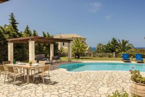The swimming pool at or close to Villa Helios