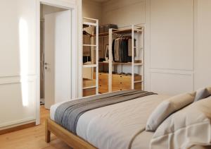 a bedroom with a bed and a closet at Casa Visconti Milano in Milan
