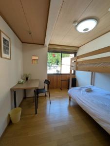 Postel nebo postele na pokoji v ubytování Gondola House