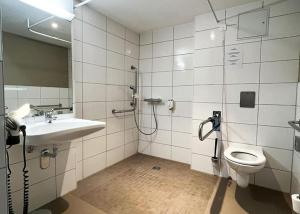 Koupelna v ubytování Hotel Sportforum