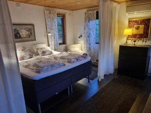 a bedroom with a bed and a window at Haby House in Skene