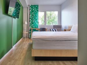 Postel nebo postele na pokoji v ubytování IKEA Hotell + 32 fotografií