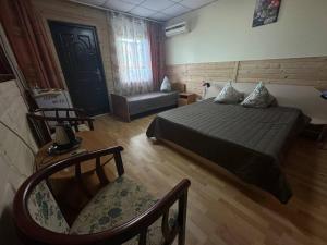 Postel nebo postele na pokoji v ubytování Микрон