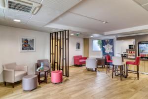 Posezení v ubytování Ace Hotel Issoire
