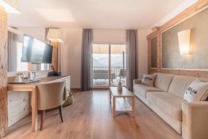 Posezení v ubytování Cristallo Sport & Wellness Hotel