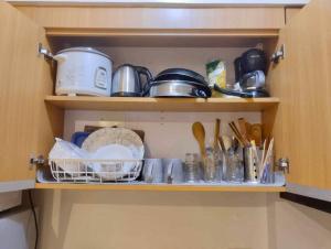 Dapur atau dapur kecil di Pet Friendly 2BR Condo with PS4 near Abreeza