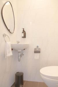 Ένα μπάνιο στο Apartment in the heart of Hasselt